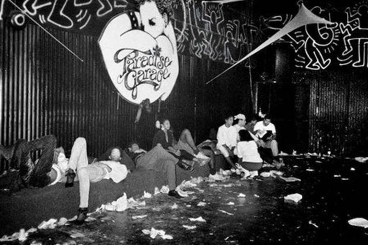Paradise Garage interior with logo and Keith Haring murals.